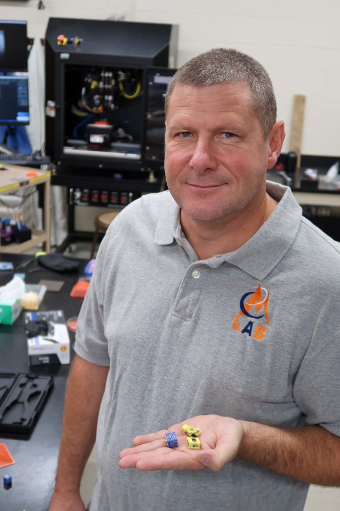 Dr. Raymond Rumpf in lab